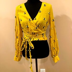 Embroidered bee shirt
